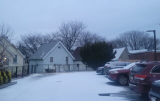 Cleared parking lot after professional snow plowing for safe winter access