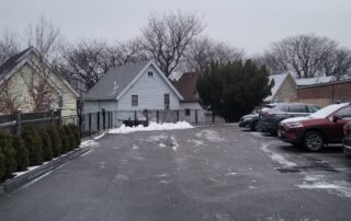 Cleared parking lot after professional snow plowing for safe winter access